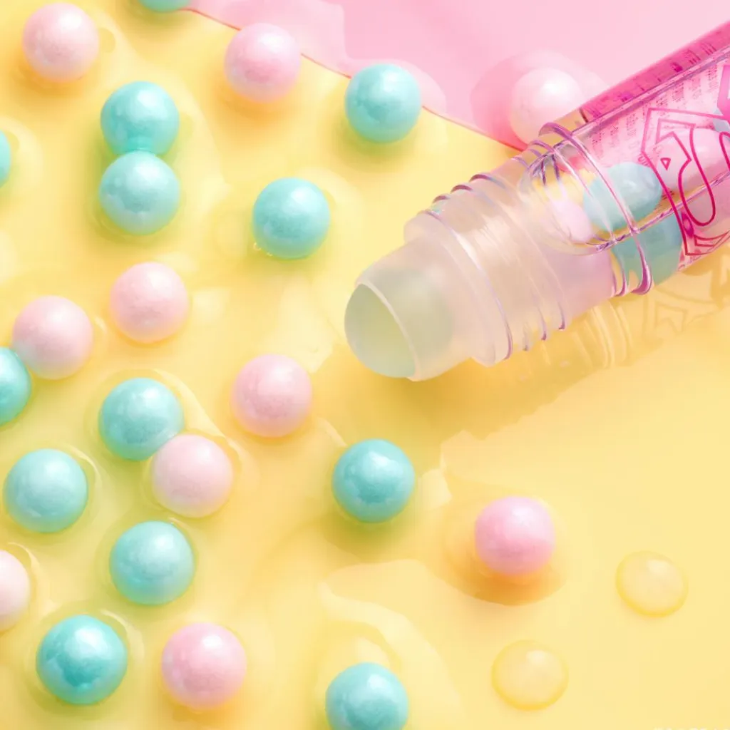 Essence Lipgloss>Superman Lip Oil Roll-on